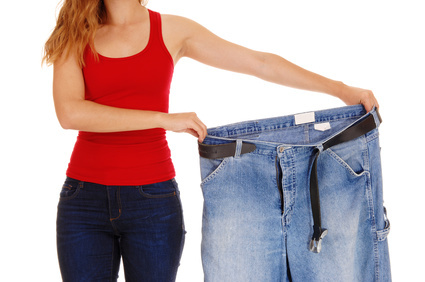 Woman Showing Healthy Weight Loss with Big Pants